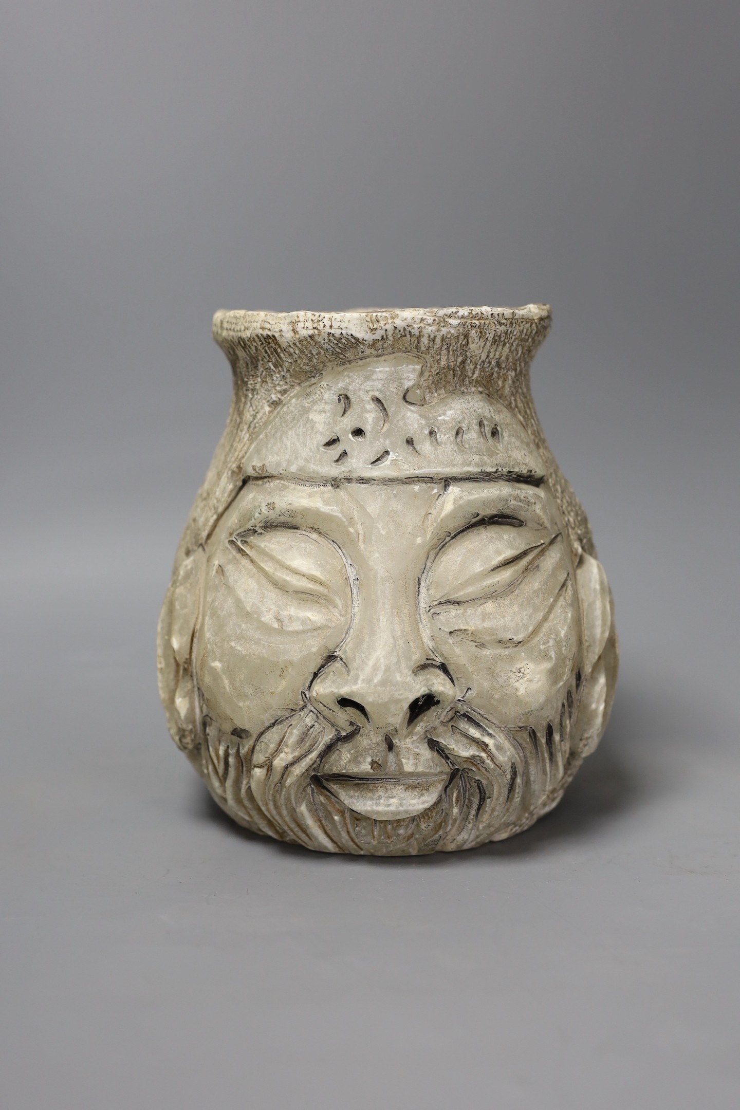 A carved alabaster twin face vase, signed, 18 cms high